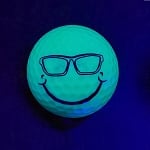 BLACK LIGHT SMILEY WITH GLASSES GOLF BALL